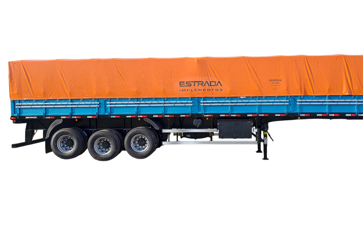 Semirreboque graneleiro 3 eixos Estrada Implementos, com carroceria azul e lona laranja Vinilona Sansuy, projetado para transporte de grãos com eficiência e segurança.