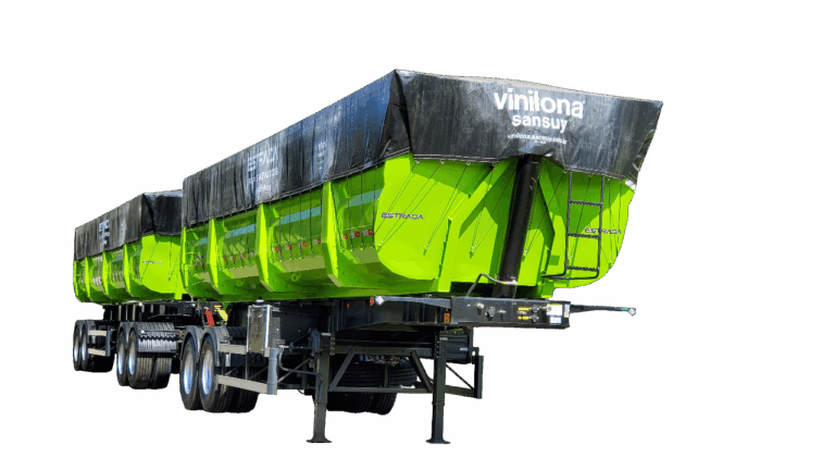 Rodotrem basculante Estrada Implementos, na cor verde com lona preta Vinilona Sansuy, projetado para transporte de grãos com alta capacidade, resistência e eficiência logística.